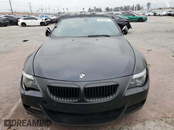 2009 BMW 6 Series M6 z VIN WBSEK935X9CY80091, wystawiony jako Copart lot #43348935 z przebiegiem 128 438 mil mil oraz Tytuł czysty. Historia ofert i sprzedaży dostępna na DreamBid. Obrazek 5.