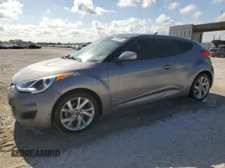 2016 Hyundai Veloster z VIN KMHTC6AD7GU300528, wystawiony jako Copart lot #57501955 z przebiegiem 72 437 mil mil oraz Szkody całkowita. Historia ofert i sprzedaży dostępna na DreamBid. Obrazek 1.