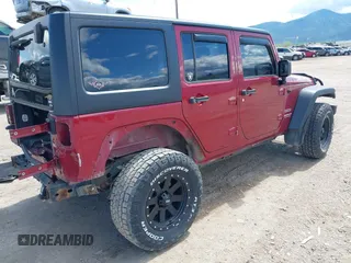 2012 Jeep Wrangler Unlimited Sport z VIN 1C4BJWDG8CL258625, wystawiony jako IAAI lot #42266102 z przebiegiem 58 594 mil mil oraz . Historia ofert i sprzedaży dostępna na DreamBid. Obrazek 4.