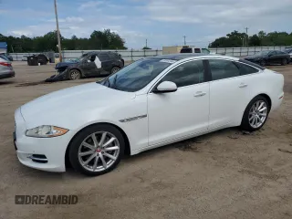 2015 Jaguar XJ with VIN SAJWA1CZ9F8V82974, listed as a Copart auction lot 59364344 with 64,012 mi miles and Salvage Title. Bid and sale history available at carsss.com. Image 1.