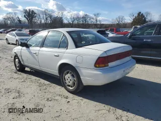 1996 Saturn SL with VIN 1G8ZK5279TZ162812, listed as a Copart auction lot 87079874 with 143,461 mi miles and Salvage title. Bid and sale history available at DreamBid. Image 2.