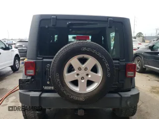 2017 Jeep Wrangler Sport with VIN 1C4AJWAGXHL540496, listed as a Copart auction lot 50692705 with 115,042 mi miles and Salvage Title. Bid and sale history available at DreamBid. Image 6.