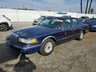 1995 Lincoln Town Car Signature z VIN 1LNLM82W5SY689342, wystawiony jako Copart lot #83233784 z przebiegiem 160 801 mil mil oraz Szkoda całkowita • Salvage title. Historia ofert i sprzedaży dostępna na DreamBid. Obrazek 1.