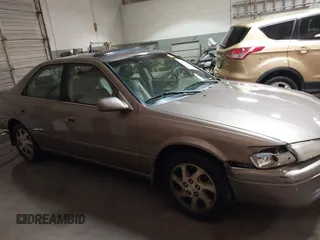 1999 Toyota Camry LE z VIN JT2BF28K7X0167855, wystawiony jako IAAI lot #41609230 z przebiegiem 242 398 mil mil oraz . Historia ofert i sprzedaży dostępna na DreamBid. Obrazek 13.