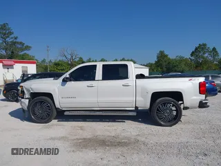 2017 Chevrolet Silverado 1500 LT with VIN 3GCUKREC4HG364108, listed as a IAAI auction lot 42050014 with 148,691 mi miles and . Bid and sale history available at DreamBid. Image 14.