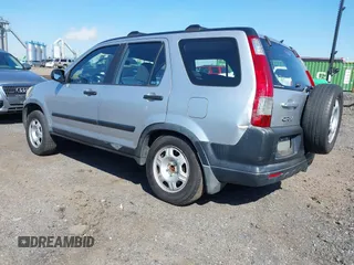 2006 Honda CR-V LX with VIN JHLRD78586C029065, listed as a IAAI auction lot 42043651 with 191,318 mi miles and . Bid and sale history available at carsss.com. Image 3.