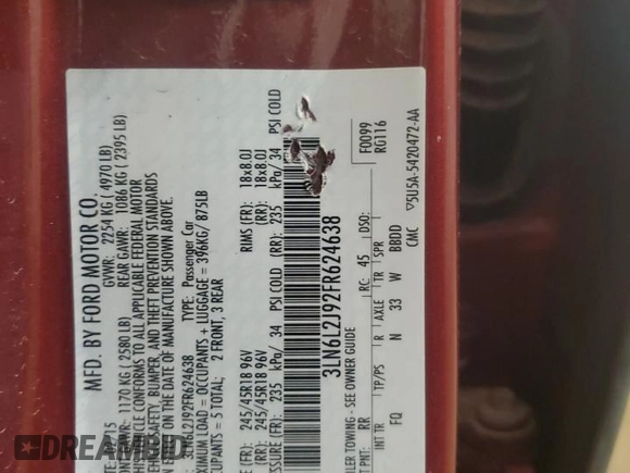 2015 Lincoln MKZ z VIN 3LN6L2J92FR624638, wystawiony jako Copart lot #57158245 z przebiegiem 150 045 mil mil oraz Szkoda całkowita • Salvage title. Historia ofert i sprzedaży dostępna na DreamBid. Obrazek 12.