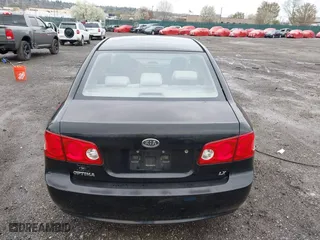 2007 Kia Optima LX with VIN KNAGE123175133499, listed as a IAAI auction lot 41958955 with 132,480 mi miles. Bid and sale history available at carsss.com. Image 17.