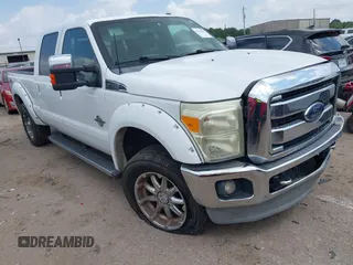 2012 Ford F-250 XL z VIN 1FT7W2BT3CED14989, wystawiony jako IAAI lot #42131833 z przebiegiem 264 756 mil mil oraz . Historia ofert i sprzedaży dostępna na DreamBid. Obrazek 1.