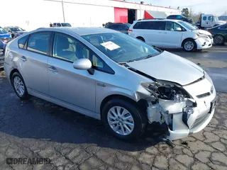 2013 Toyota Prius Plug-In with VIN JTDKN3DPXD3040321, listed as a IAAI auction lot 41477480 with 109,764 mi miles. Bid and sale history available at carsss.com. Image 1.