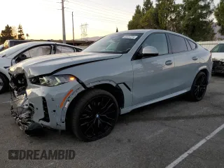 2024 BMW X6 xDrive40i with VIN 5UX33EX04R9T50214, listed as a Copart auction lot 85332204 with 8,710 mi miles and Salvage Title. Bid and sale history available at carsss.com. Image 1.