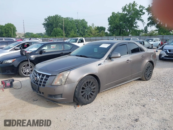 2012 Cadillac CTS Luxury with VIN 1G6DE5E5XC0137961, listed as a IAAI auction lot 42504953 with 179,263 mi miles and . Bid and sale history available at DreamBid. Image 2.