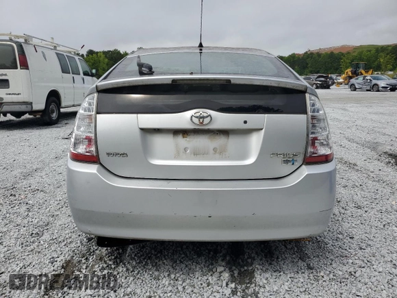 2007 Toyota Prius z VIN JTDKB20U377546391, wystawiony jako Copart lot #58447155 z przebiegiem 215 704 mil mil oraz Czysty tytuł • Clean title. Historia ofert i sprzedaży dostępna na DreamBid. Obrazek 6.