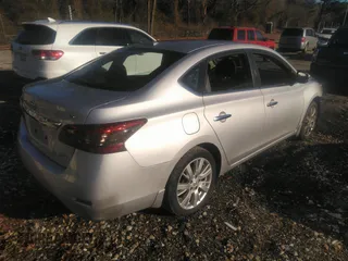 2013 Nissan Sentra S with VIN 3N1AB7AP2DL794109, listed as a IAAI auction lot 41217692 with 128,249 mi miles and . Bid and sale history available at DreamBid. Image 4.