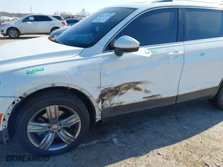 2019 Volkswagen Tiguan SEL Premium with VIN 3VV4B7AX0KM007788, listed as a IAAI auction lot 41227707 with 67,859 mi miles. Bid and sale history available at carsss.com. Image 6.