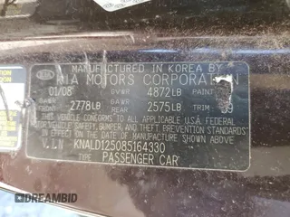 2008 Kia Amanti z VIN KNALD125085164330, wystawiony jako Copart lot #56377374 z przebiegiem 156 972 mil mil oraz Szkody całkowita. Historia ofert i sprzedaży dostępna na DreamBid. Obrazek 12.