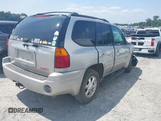 2004 GMC Envoy SLT with VIN 1GKDS13S742230325, listed as a IAAI auction lot 42385113 with 177,989 mi miles and . Bid and sale history available at DreamBid. Image 4.