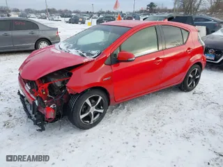 2015 Toyota Prius c One with VIN JTDKDTB39F1109923, listed as a IAAI auction lot 41336298 with 158,995 mi miles. Bid and sale history available at carsss.com. Image 2.
