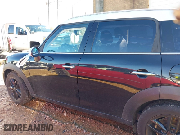 2015 MINI Countryman with VIN WMWZB3C59FWR44862, listed as a IAAI auction lot 41199254 with 94,074 mi miles and . Bid and sale history available at DreamBid. Image 14.