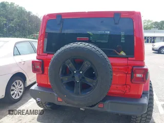 2021 Jeep Wrangler Unlimited Sahara z VIN 1C4HJXEGXMW631033, wystawiony jako IAAI lot #42550070 z przebiegiem 54 429 mil mil oraz . Historia ofert i sprzedaży dostępna na DreamBid. Obrazek 16.