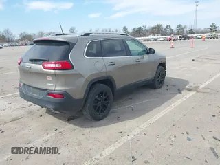 2018 Jeep Cherokee Latitude Plus with VIN 1C4PJMLXXJD571713, listed as a IAAI auction lot 41771661 with 87,580 mi miles and . Bid and sale history available at DreamBid. Image 4.