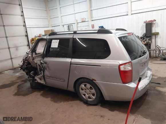 2006 Kia Sedona LX with VIN KNDMB233566038391, listed as a IAAI auction lot 41617002 with 273,398 mi miles. Bid and sale history available at carsss.com. Image 13.