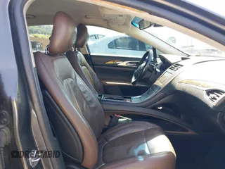 2016 Lincoln MKZ Hybrid with VIN 3LN6L2LU7GR616845, listed as a IAAI auction lot 42651286 with Not provided miles and . Bid and sale history available at DreamBid. Image 5.