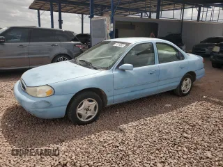 1998 Ford Contour SE Fleet with VIN 1FAFP66LXWK197384, listed as a Copart auction lot 51519385 with 56,958 mi miles and Clean Title. Bid and sale history available at carsss.com. Image 1.