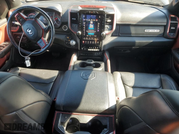 2019 Ram 1500 Rebel z VIN 1C6SRFLT5KN811457, wystawiony jako Copart lot #57034285 z przebiegiem 84 077 mil mil oraz Szkoda całkowita • Salvage title. Historia ofert i sprzedaży dostępna na DreamBid. Obrazek 8.