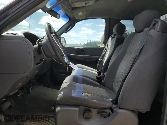 2003 Ford F-150 XL with VIN 2FTRX18L43CA20532, listed as a Copart auction lot 63528695 with 277,964 mi miles and Salvage title. Bid and sale history available at DreamBid. Image 7.