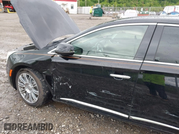 2014 Cadillac XTS Luxury with VIN 2G61M5S32E9231544, listed as a IAAI auction lot 42340088 with 74,518 mi miles and . Bid and sale history available at DreamBid. Image 6.