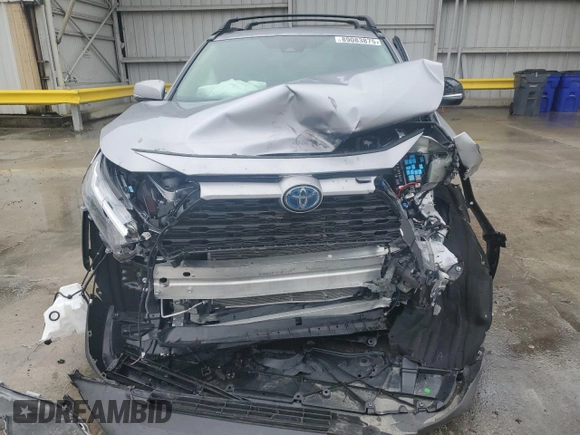 2024 Toyota RAV4 Hybrid XLE Premium with VIN 4T3B6RFV9RU167402, listed as a Copart auction lot 89083875 with 5,923 mi miles and Salvage Title. Bid and sale history available at DreamBid. Image 12.