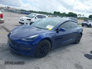 2022 Tesla Model 3 with VIN 5YJ3E1EA4NF191808, listed as a IAAI auction lot 39564406 with 6,756 mi miles. Bid and sale history available at carsss.com. Image 2.