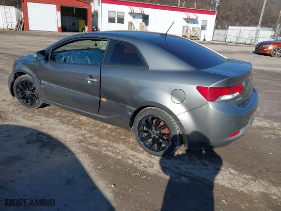 2010 Kia Forte Koup SX with VIN KNAFW6A38A5267375, listed as a IAAI auction lot 41699378 with 174,880 mi miles. Bid and sale history available at carsss.com. Image 3.