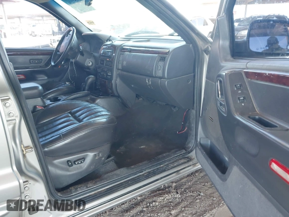 2000 Jeep Grand Cherokee Limited z VIN 1J4GW58N1YC206992, wystawiony jako IAAI lot #42057236 z przebiegiem 183 986 mil mil oraz . Historia ofert i sprzedaży dostępna na DreamBid. Obrazek 5.