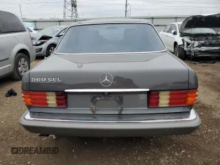 1987 Mercedes-Benz 560 with VIN WDBCA39D7HA322057, listed as a Copart auction lot 83717904 with 246,060 mi miles and Clean Title. Bid and sale history available at DreamBid. Image 6.