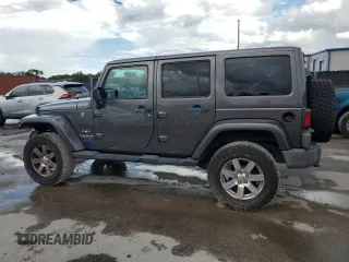 2016 Jeep Wrangler Unlimited 75th Anniversary with VIN 1C4BJWEG3GL216156, listed as a Copart auction lot 62611845 with 87,353 mi miles and Salvage title. Bid and sale history available at DreamBid. Image 2.