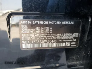 2018 BMW 5 Series 530i with VIN WBAJA5C52JWA36440, listed as a Copart auction lot 63325515 with 8,786 mi miles and Salvage title. Bid and sale history available at DreamBid. Image 12.