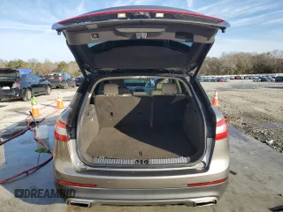 2016 Lincoln MKX Reserve z VIN 2LMPJ6LR7GBL74185, wystawiony jako Copart lot #87799275 z przebiegiem 89 977 mil mil oraz Szkoda całkowita • Salvage title. Historia ofert i sprzedaży dostępna na DreamBid. Obrazek 6.