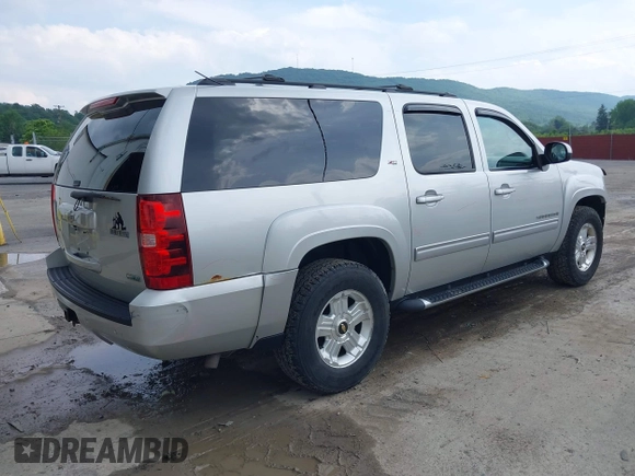 2011 Chevrolet Suburban LT with VIN 1GNSKJE32BR330742, listed as a IAAI auction lot 42435335 with 191,663 mi miles and . Bid and sale history available at DreamBid. Image 4.