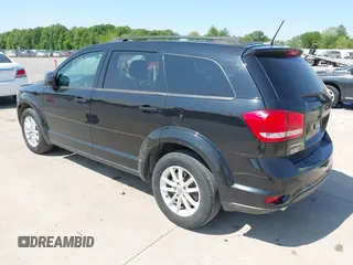 2017 Dodge Journey SXT with VIN 3C4PDCBG1HT523010, listed as a IAAI auction lot 42404624 with 198,519 mi miles and . Bid and sale history available at DreamBid. Image 3.