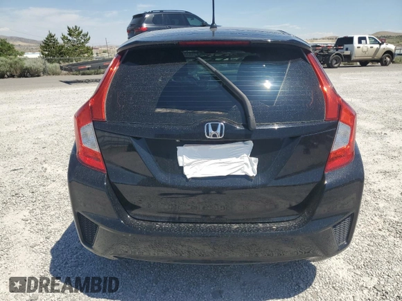 2015 Honda Fit LX z VIN 3HGGK5H52FM759746, wystawiony jako Copart lot #60486535 z przebiegiem 64 295 mil mil oraz Szkoda całkowita • Salvage title. Historia ofert i sprzedaży dostępna na DreamBid. Obrazek 6.
