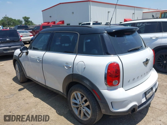 2014 MINI Countryman S with VIN WMWZC3C54EWP27859, listed as a IAAI auction lot 39592610 with 105,264 mi miles and . Bid and sale history available at DreamBid. Image 3.