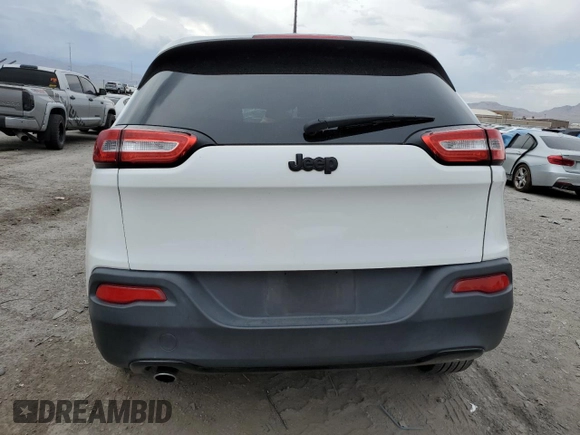 2017 Jeep Cherokee Altitude with VIN 1C4PJLAB2HW573567, listed as a Copart auction lot 59630205 with 105,975 mi miles and Salvage title. Bid and sale history available at DreamBid. Image 6.