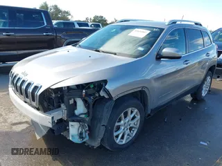 2015 Jeep Cherokee Latitude with VIN 1C4PJLCB8FW620336, listed as a IAAI auction lot 41634997 with 130,335 mi miles. Bid and sale history available at carsss.com. Image 20.