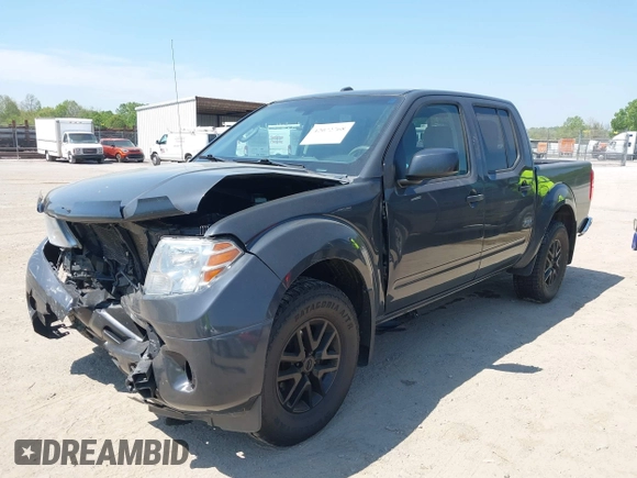 2014 Nissan Frontier SV with VIN 1N6AD0EV6EN729351, listed as a IAAI auction lot 42072768 with 149,158 mi miles and . Bid and sale history available at DreamBid. Image 2.