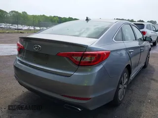2017 Hyundai Sonata Sport z VIN 5NPE34AF6HH546968, wystawiony jako IAAI lot #42084901 z przebiegiem 80 407 mil mil oraz . Historia ofert i sprzedaży dostępna na DreamBid. Obrazek 16.