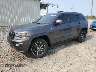 2017 Jeep Grand Cherokee Trailhawk with VIN 1C4RJFLT3HC614449, listed as a Copart auction lot 58559335 with 153,051 mi miles and Salvage title. Bid and sale history available at DreamBid. Image 1.