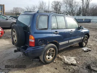 2000 Suzuki Vitara JX z VIN 2S3TD52V6Y6111082, wystawiony jako Copart lot #82444534 z przebiegiem 271 122 mil mil oraz Nie do naprawy. Historia ofert i sprzedaży dostępna na DreamBid. Obrazek 3.