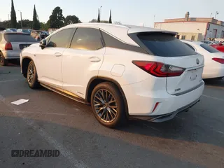 2019 Lexus RX with VIN 2T2BGMCAXKC036573, listed as a IAAI auction lot 41299079 with 104,568 mi miles. Bid and sale history available at carsss.com. Image 3.
